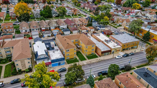 an aerial view of a houses with outdoor space