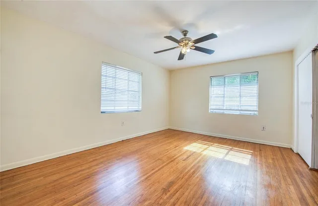 a view of an empty room with a window