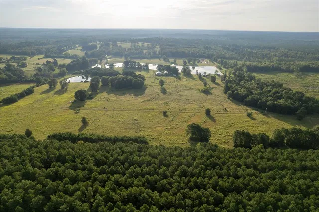 a view of a lake in middle of the town