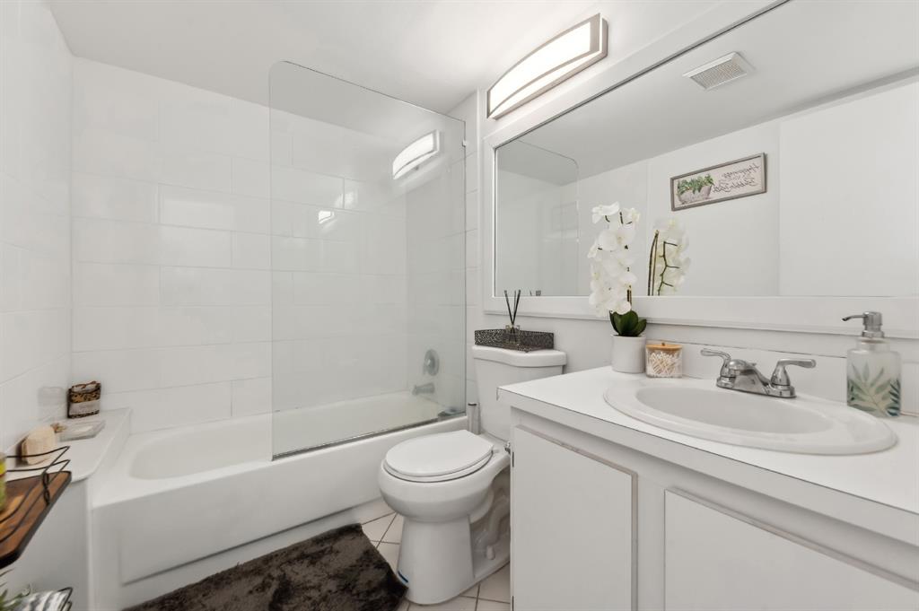 608 Sea Pine Way, Unit D2 Greenacres, FL 33415 - Photo 10 of 13 a bathroom with a sink a toilet and a bathtub