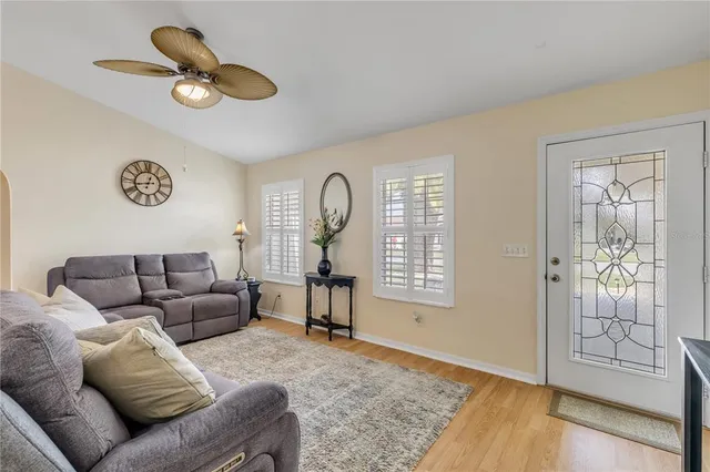 a living room with furniture and a table