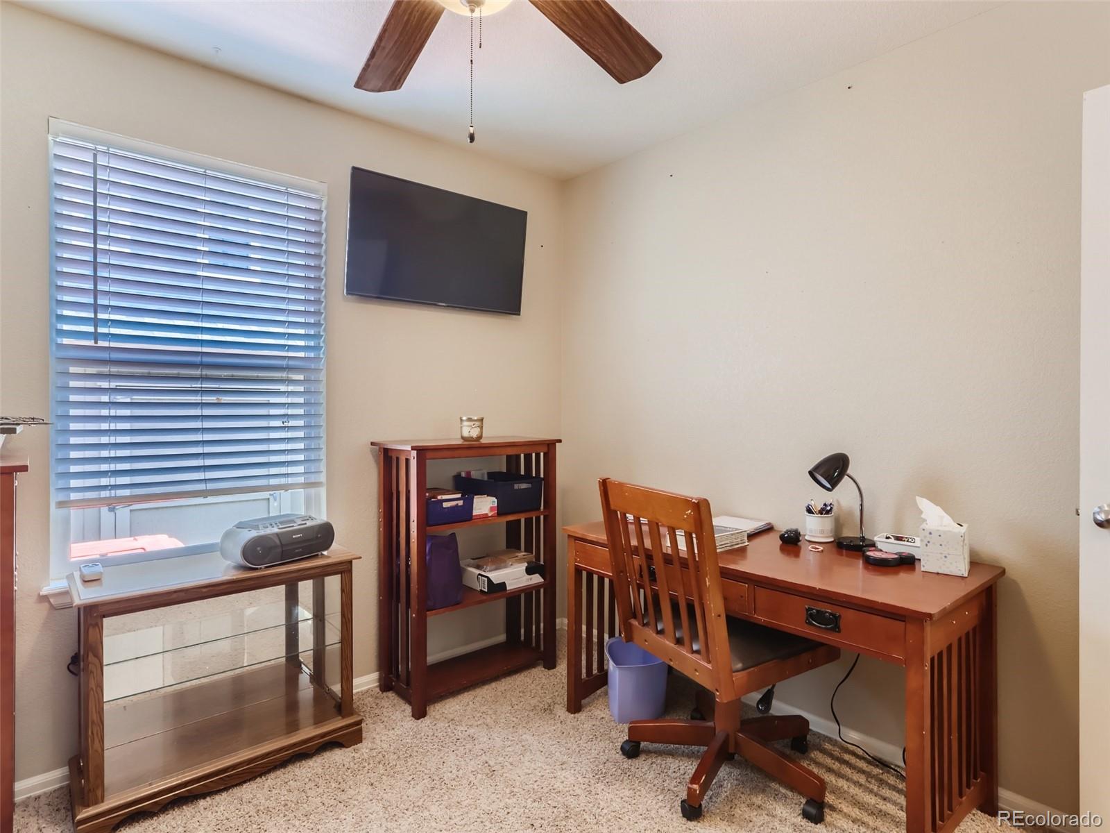 8080 Raspberry Drive Frederick, CO 80504 - Photo 14 of 29 a view of a workspace with furniture