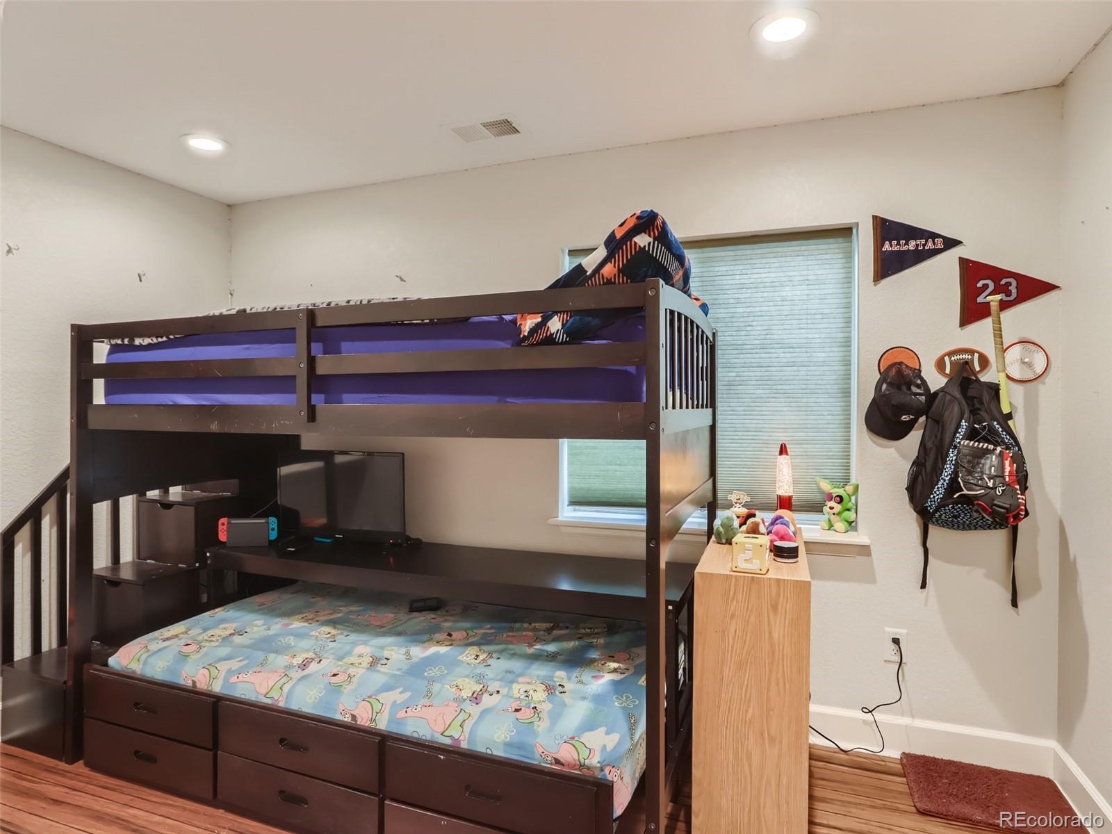 8080 Raspberry Drive Frederick, CO 80504 - Photo 18 of 29 a room with storage and utility