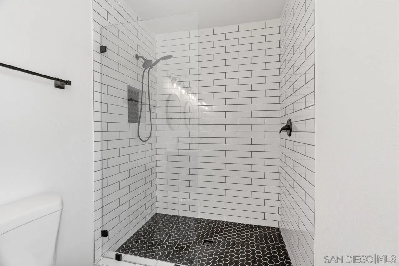 1706 Catalpa Road Carlsbad, CA 92011 - Photo 18 of 41 a bathroom with a shower