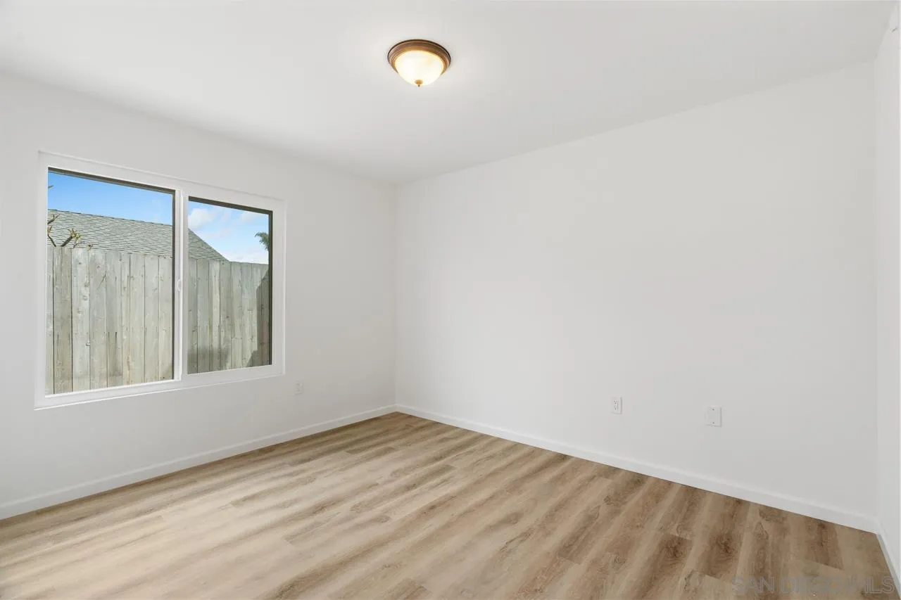 1706 Catalpa Road Carlsbad, CA 92011 - Photo 22 of 41 an empty room with a window