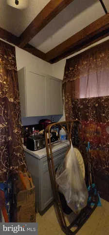 a backyard of a house with outdoor seating