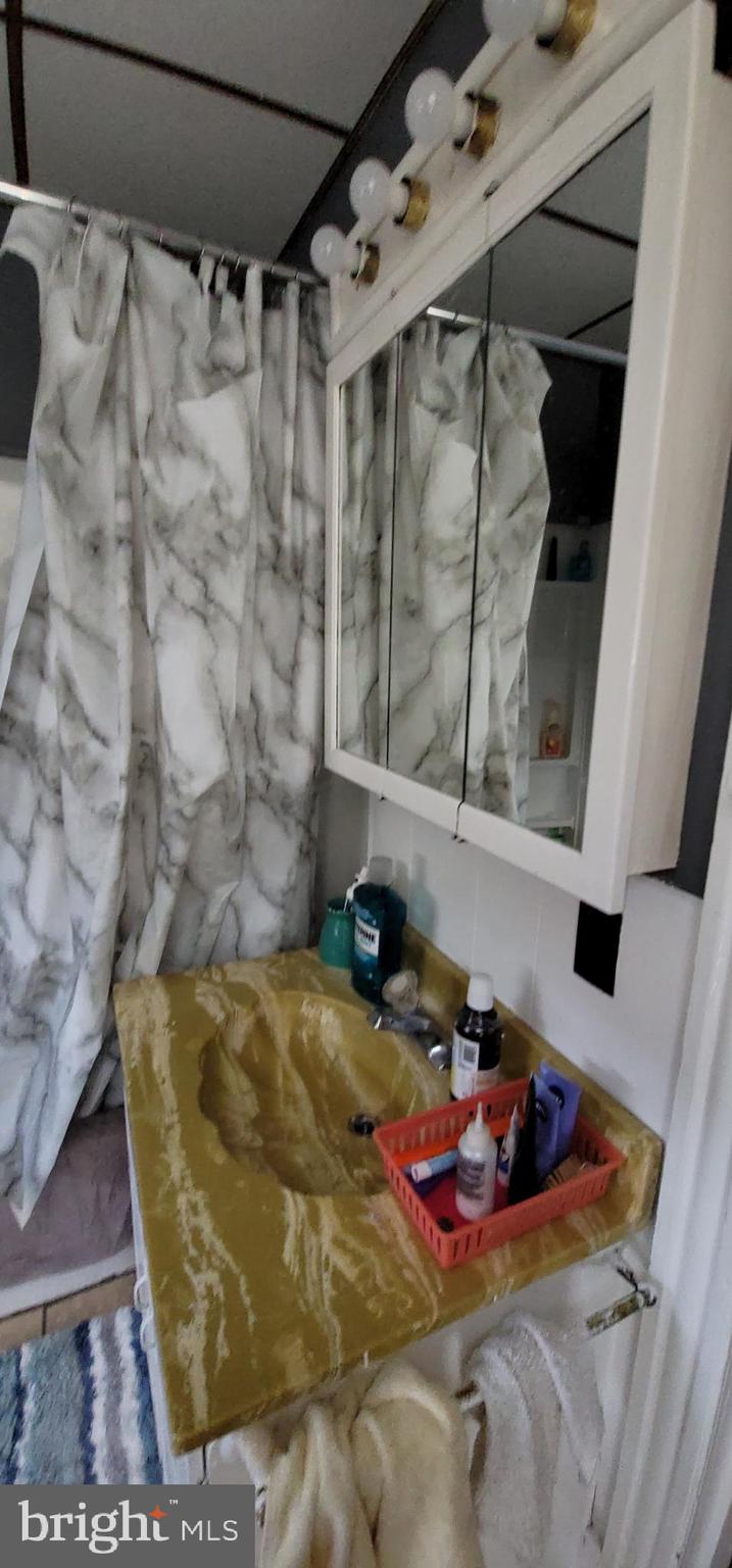 1357 North 10th Street Reading, PA 19604 - Photo 26 of 40 a bedroom with a bed and a window