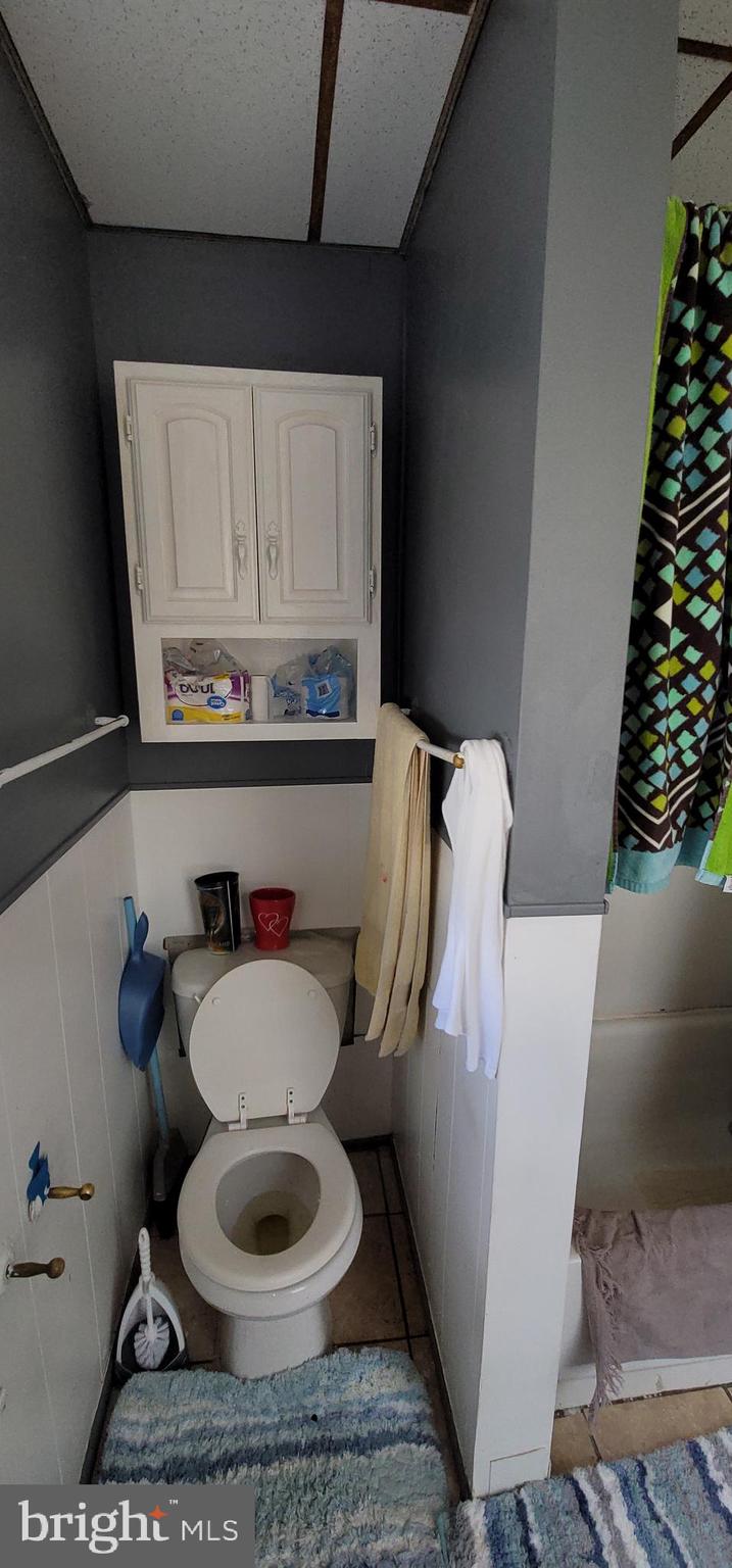 1357 North 10th Street Reading, PA 19604 - Photo 27 of 40 a bathroom with a toilet and a sink