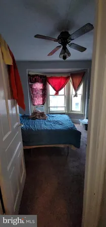 a room with a cabinets and a fireplace