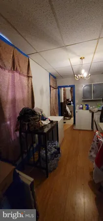 a room with furniture and flat screen tv