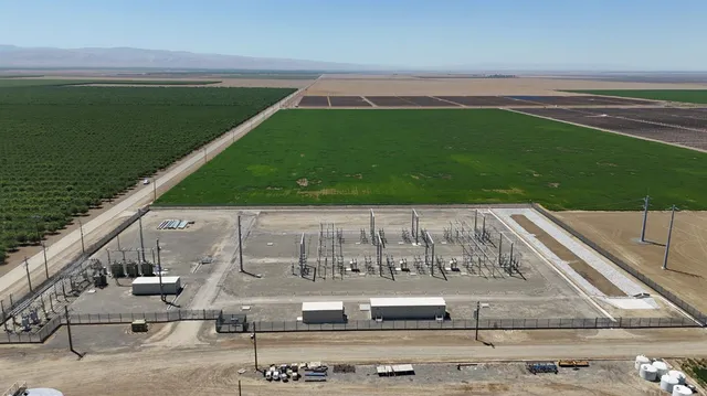 a view of a lake with a yard