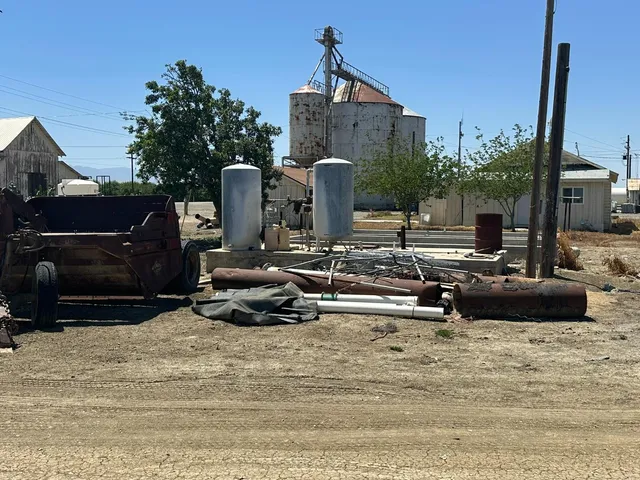 a table and chairs in front of a door