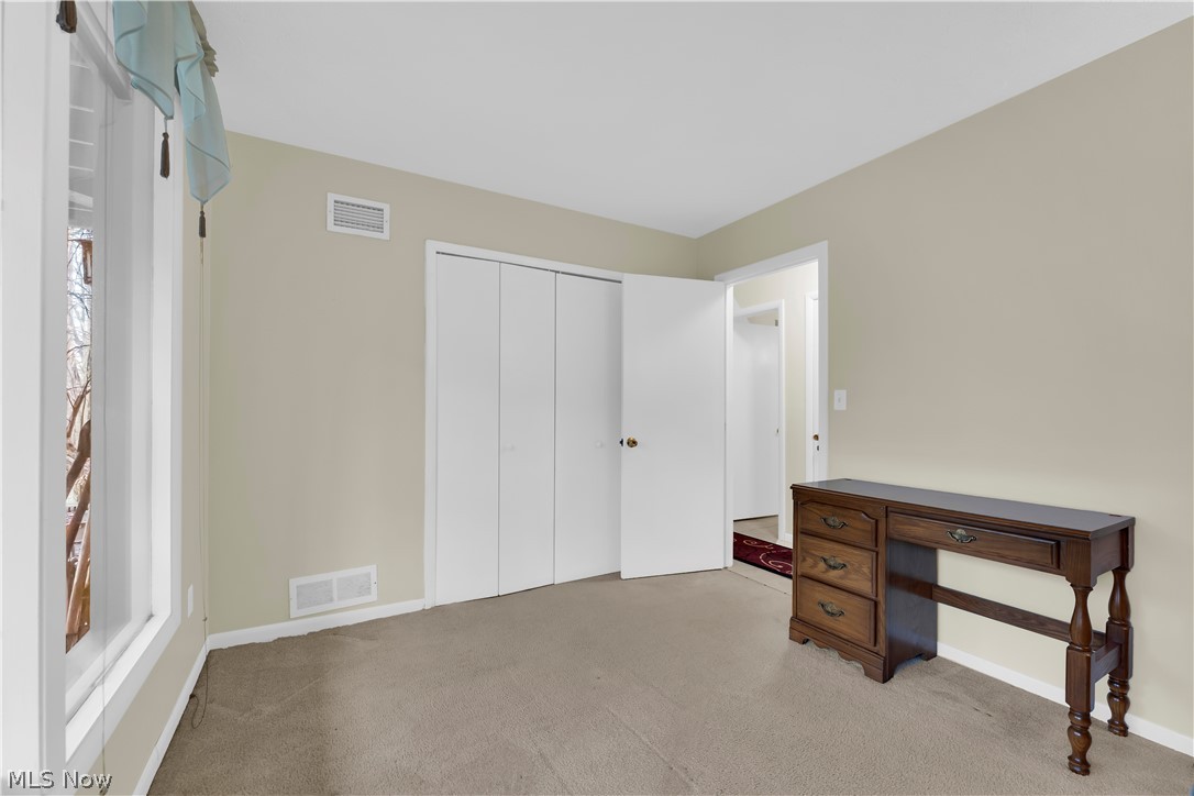 985 Canyon View Road, Unit 108D Northfield, OH 44067 - Photo 11 of 18 Unfurnished office featuring carpet floors and baseboards