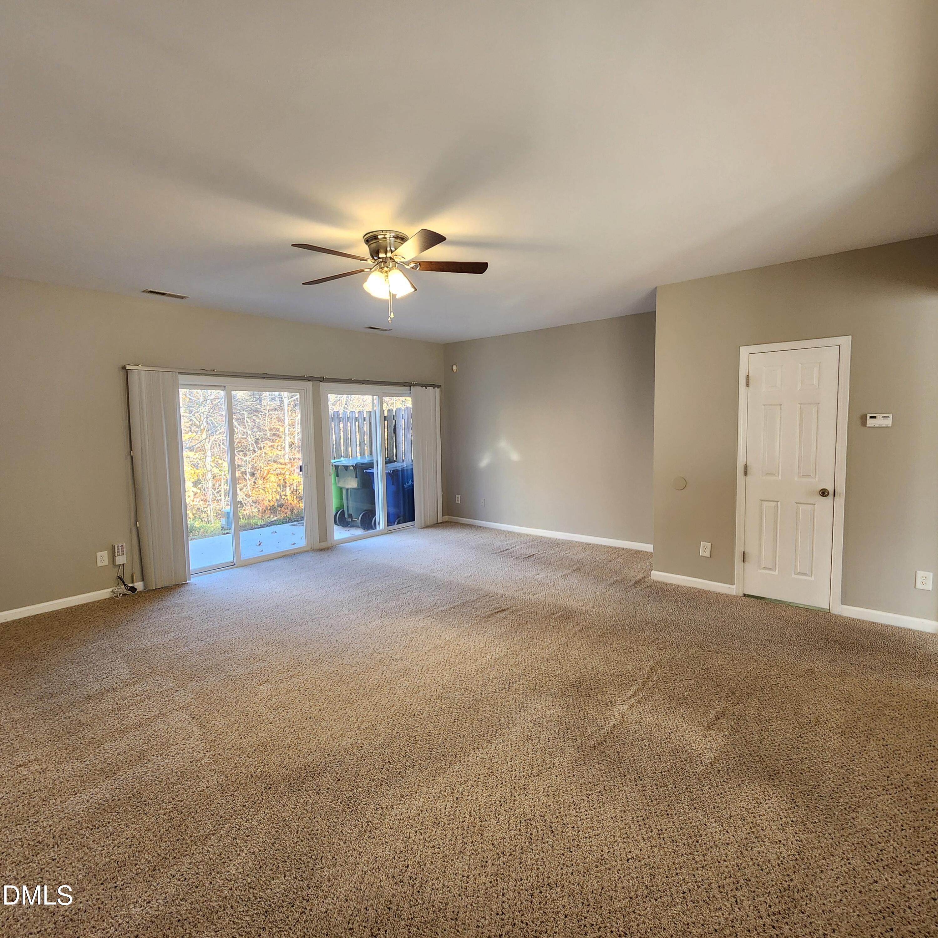 8212 Clasara Circle Raleigh, NC 27613 - Photo 14 of 20 a view of an empty room with a window