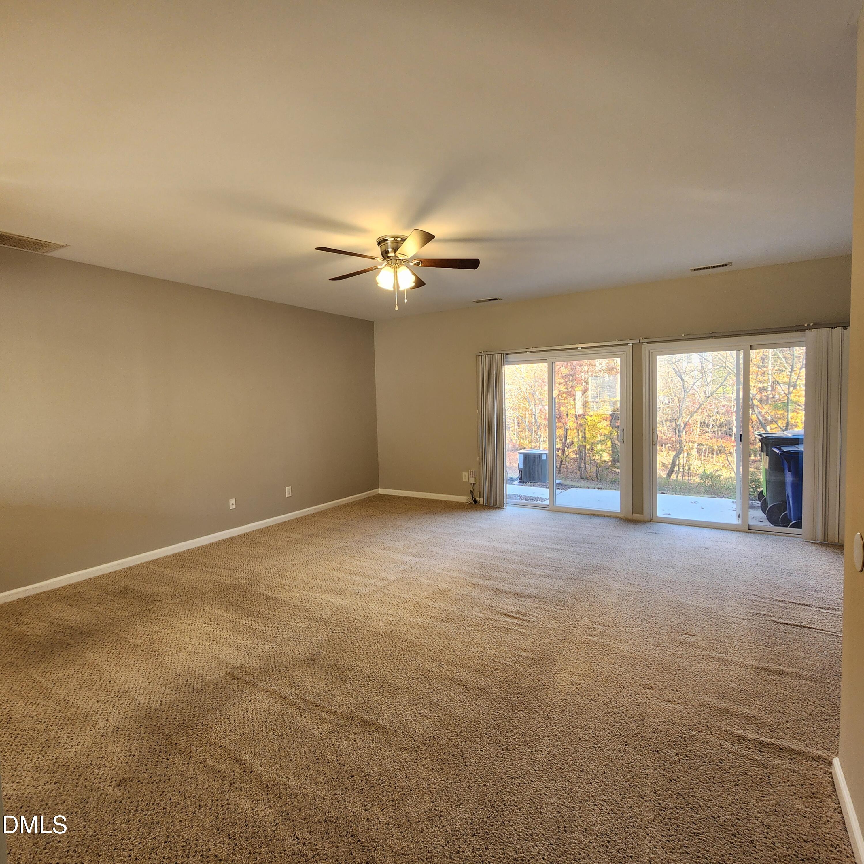 8212 Clasara Circle Raleigh, NC 27613 - Photo 15 of 20 a view of an empty room with a window