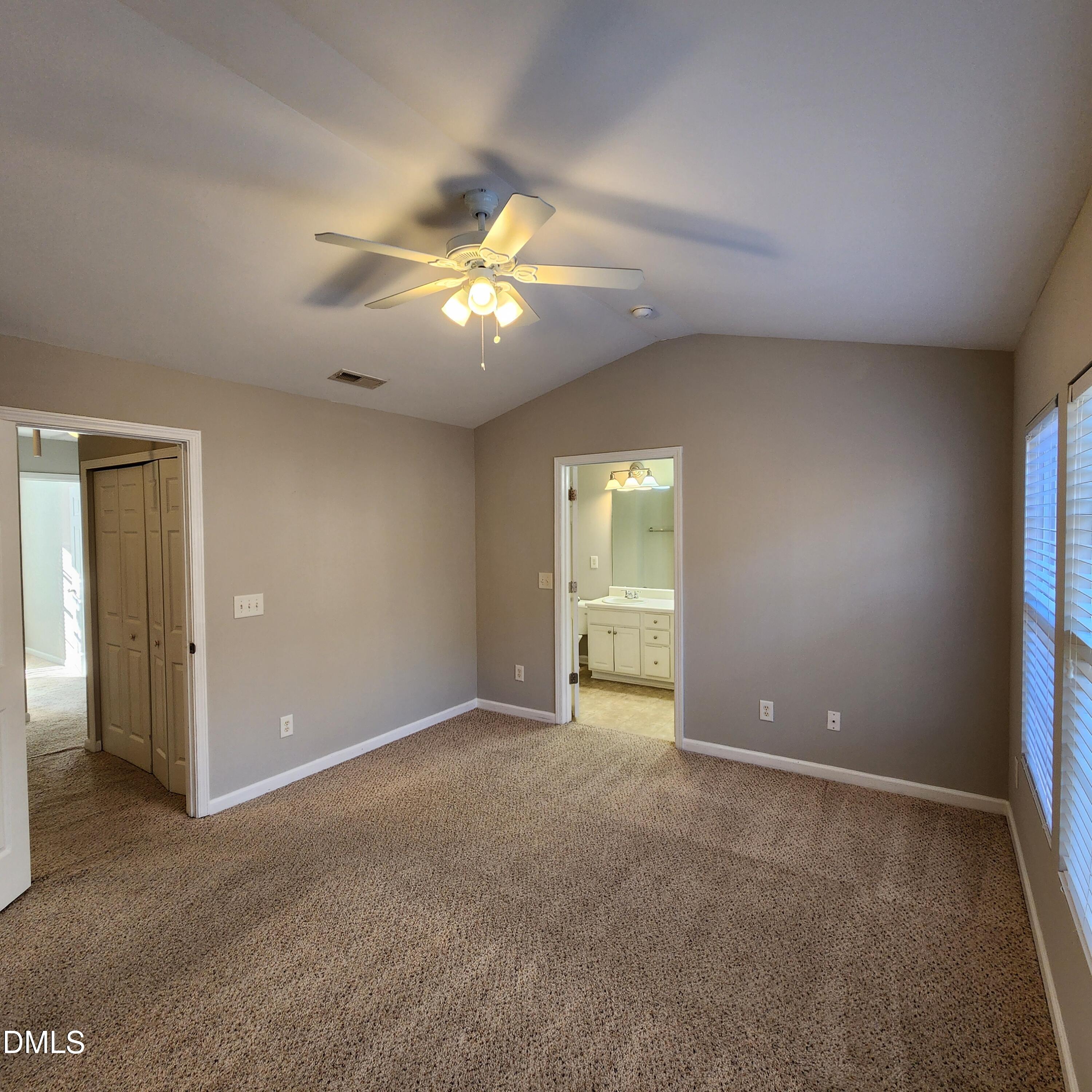 8212 Clasara Circle Raleigh, NC 27613 - Photo 16 of 20 a view of an empty room with a window
