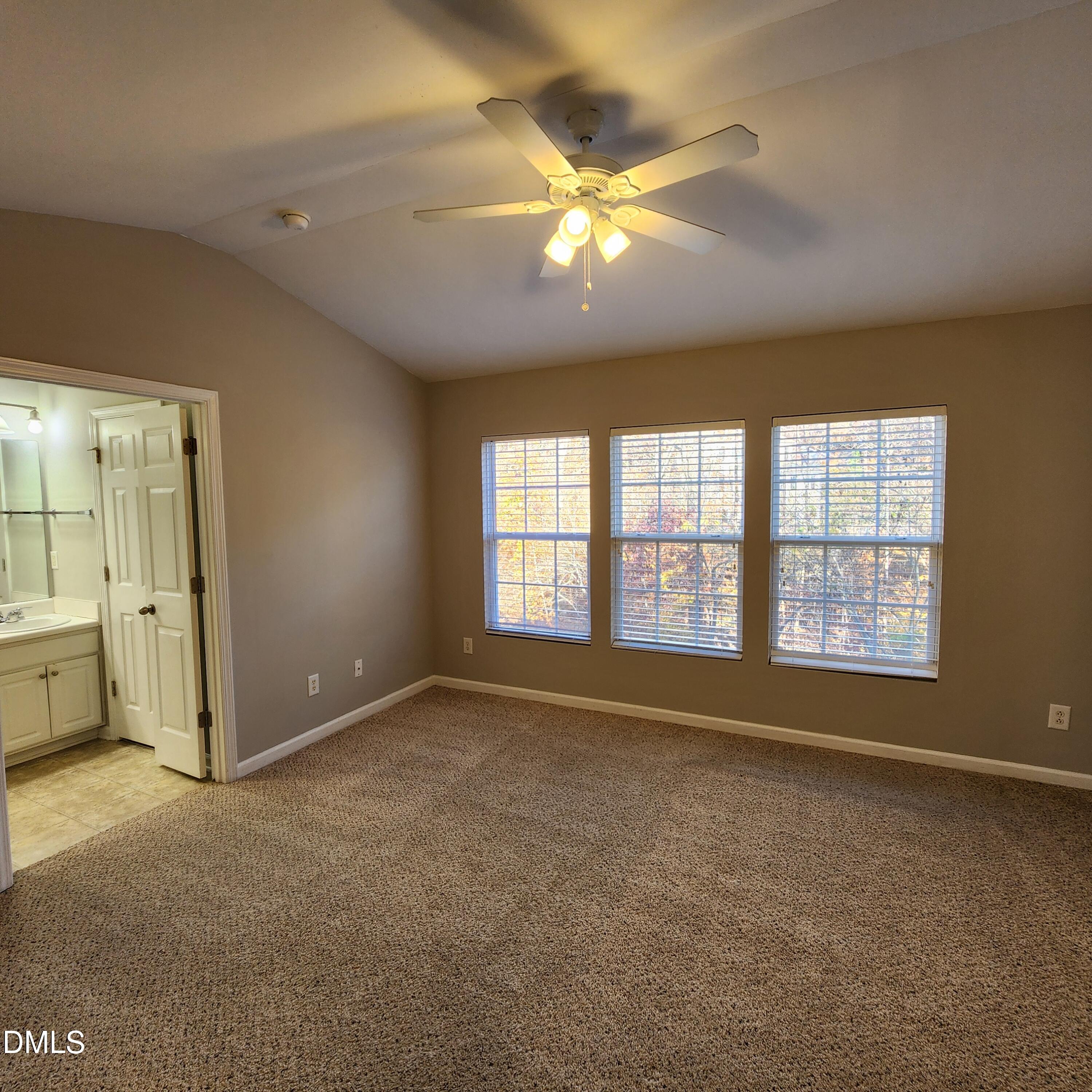 8212 Clasara Circle Raleigh, NC 27613 - Photo 17 of 20 a view of an empty room with a window