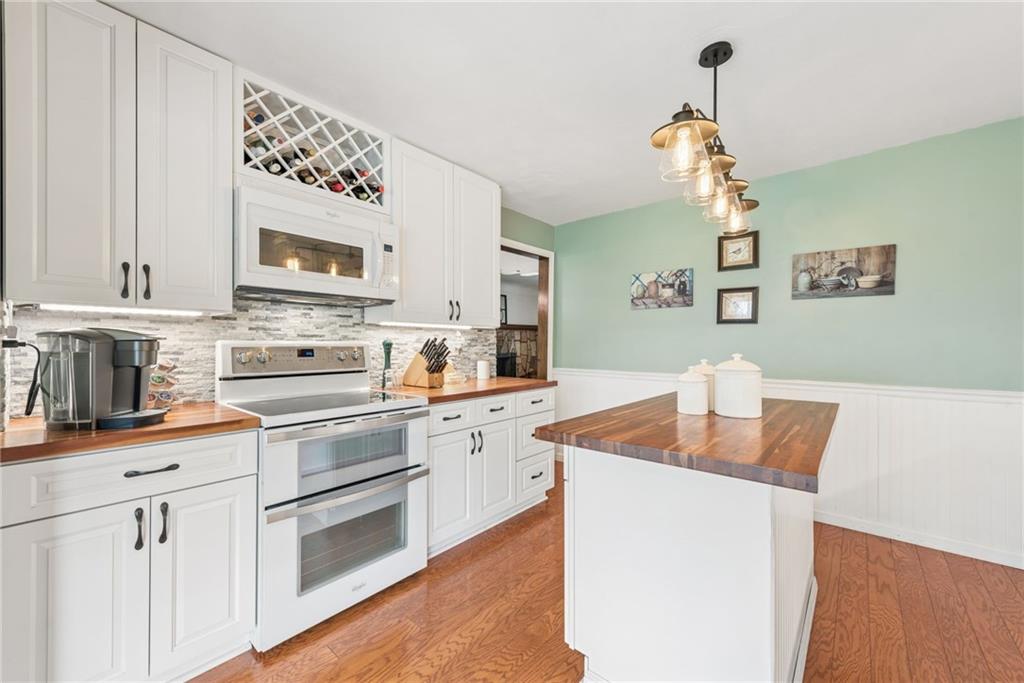 1824 Washington Road Apollo, PA 15613 - Photo 11 of 29 a kitchen with stainless steel appliances granite countertop a sink and a stove