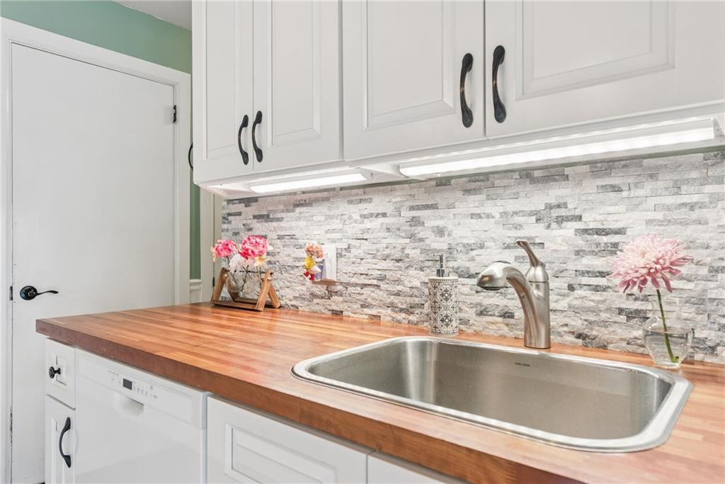 1824 Washington Road Apollo, PA 15613 - Photo 12 of 29 a kitchen with a sink and a refrigerator