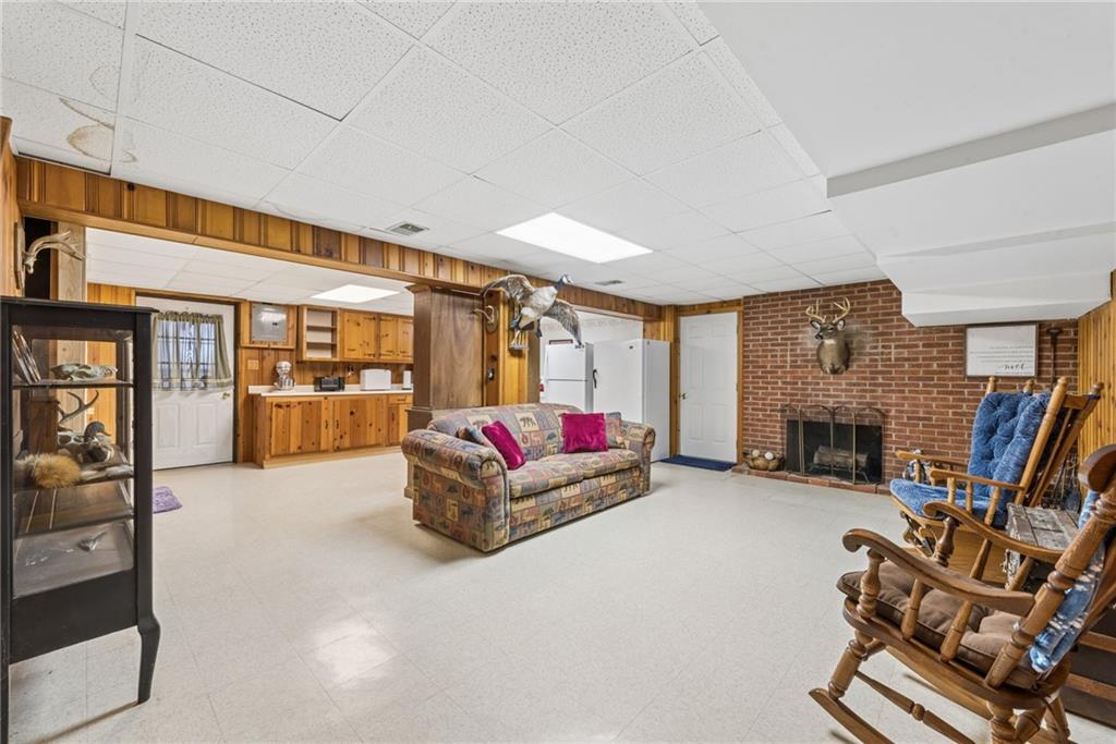 1824 Washington Road Apollo, PA 15613 - Photo 19 of 29 a living room with furniture and a fireplace