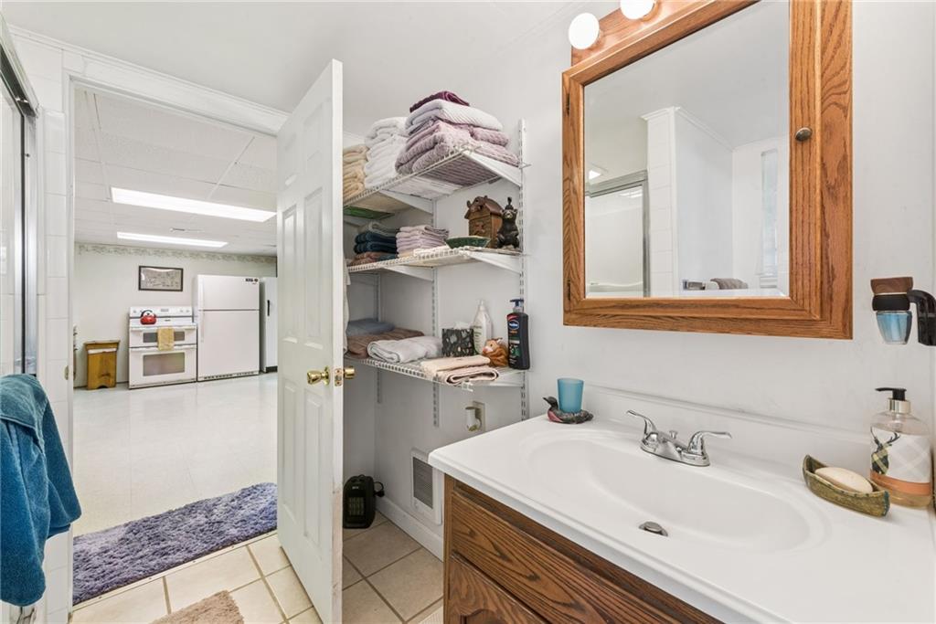 1824 Washington Road Apollo, PA 15613 - Photo 25 of 29 a bathroom with a sink vanity granite and a mirror