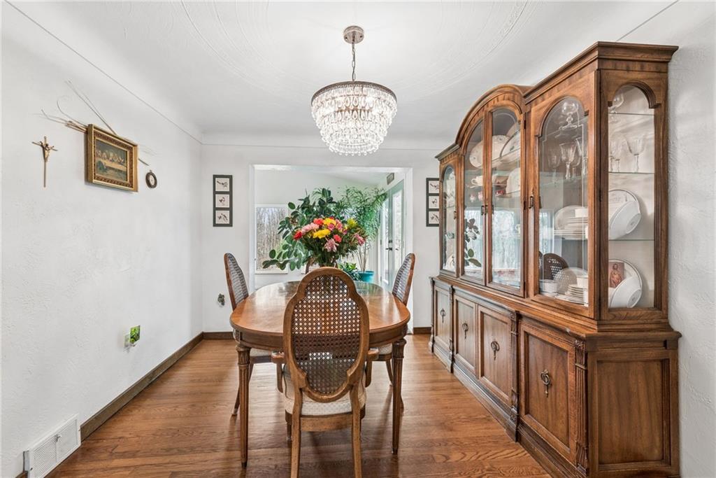 1824 Washington Road Apollo, PA 15613 - Photo 7 of 29 a view of a dining room with furniture and chandelier