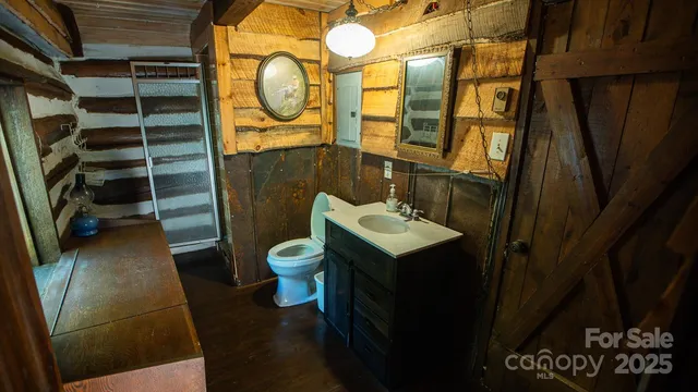 a bathroom with a sink and toilet