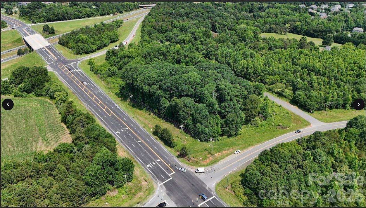 0 Brief Road Mint Hill, NC 28227 - Photo 2 of 6 a view of a garden with an umbrella in the background