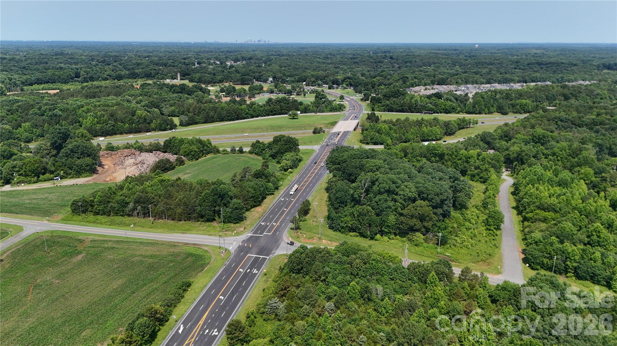 0 Brief Road Mint Hill, NC 28227 - Photo 3 of 6 a view of a city with lush green forest