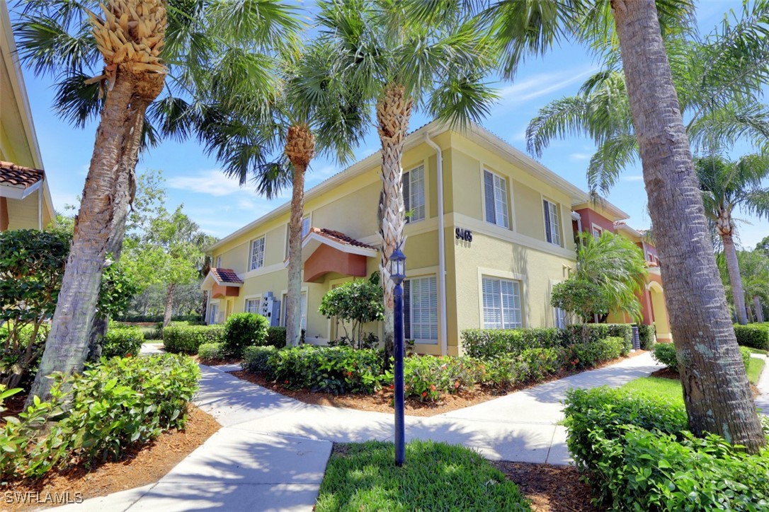 9465 Ivy Brook Run, Unit 901 Fort Myers, FL 33913 - Photo 24 of 24 a front view of house and yard with green space
