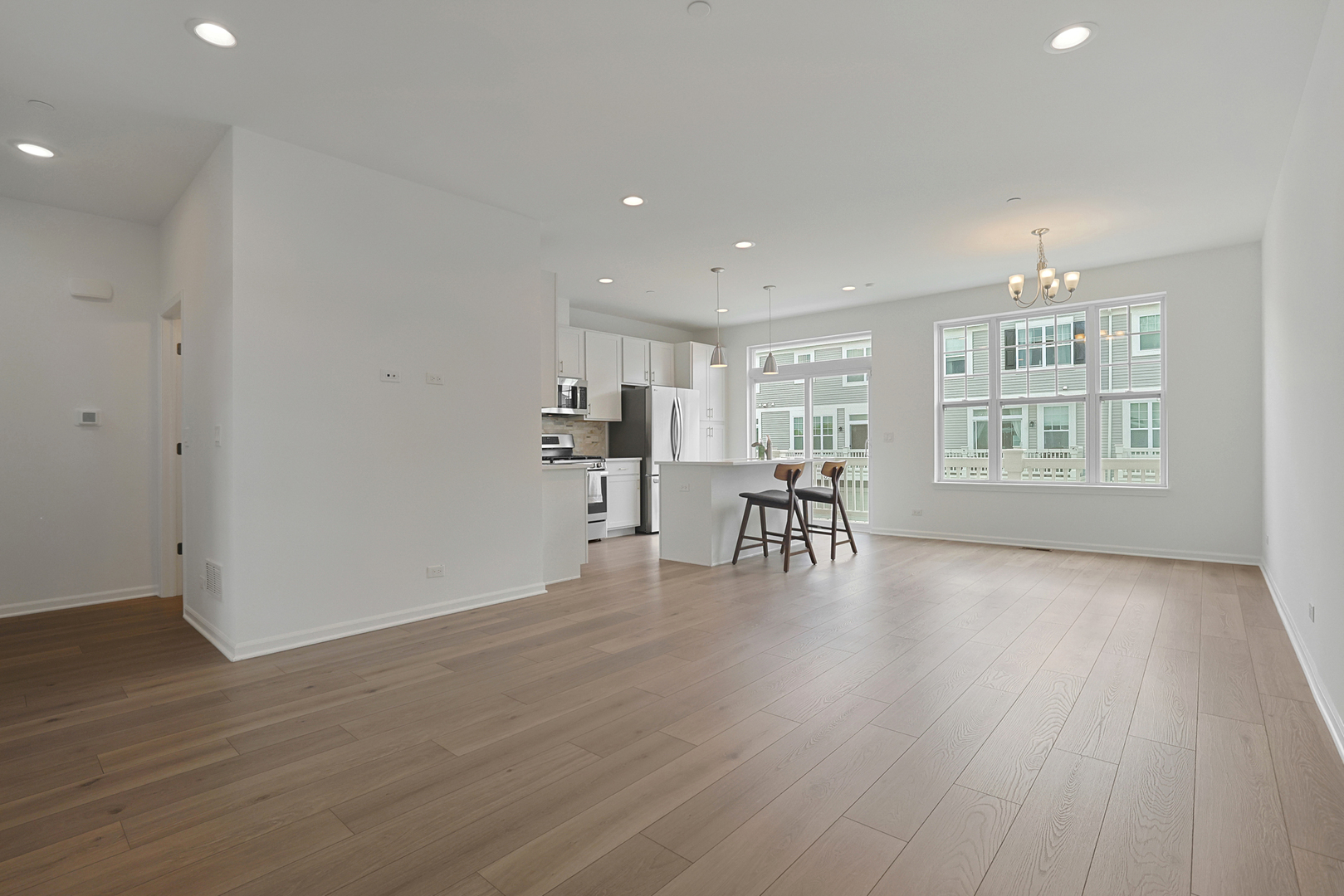 316 Timberleaf Circle Roselle, IL 60172 - Photo 12 of 37 a view of kitchen with furniture and wooden floor