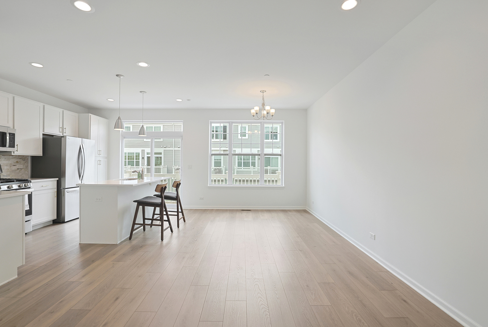 316 Timberleaf Circle Roselle, IL 60172 - Photo 13 of 37 an empty room with wooden floor and furniture
