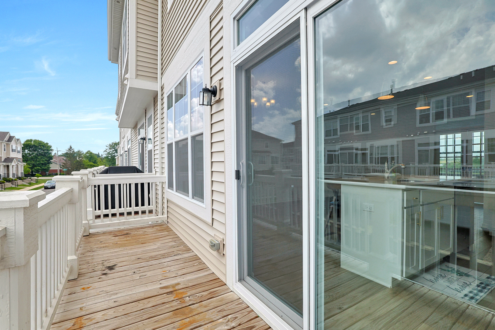 316 Timberleaf Circle Roselle, IL 60172 - Photo 18 of 37 a view of a balcony with wooden floor