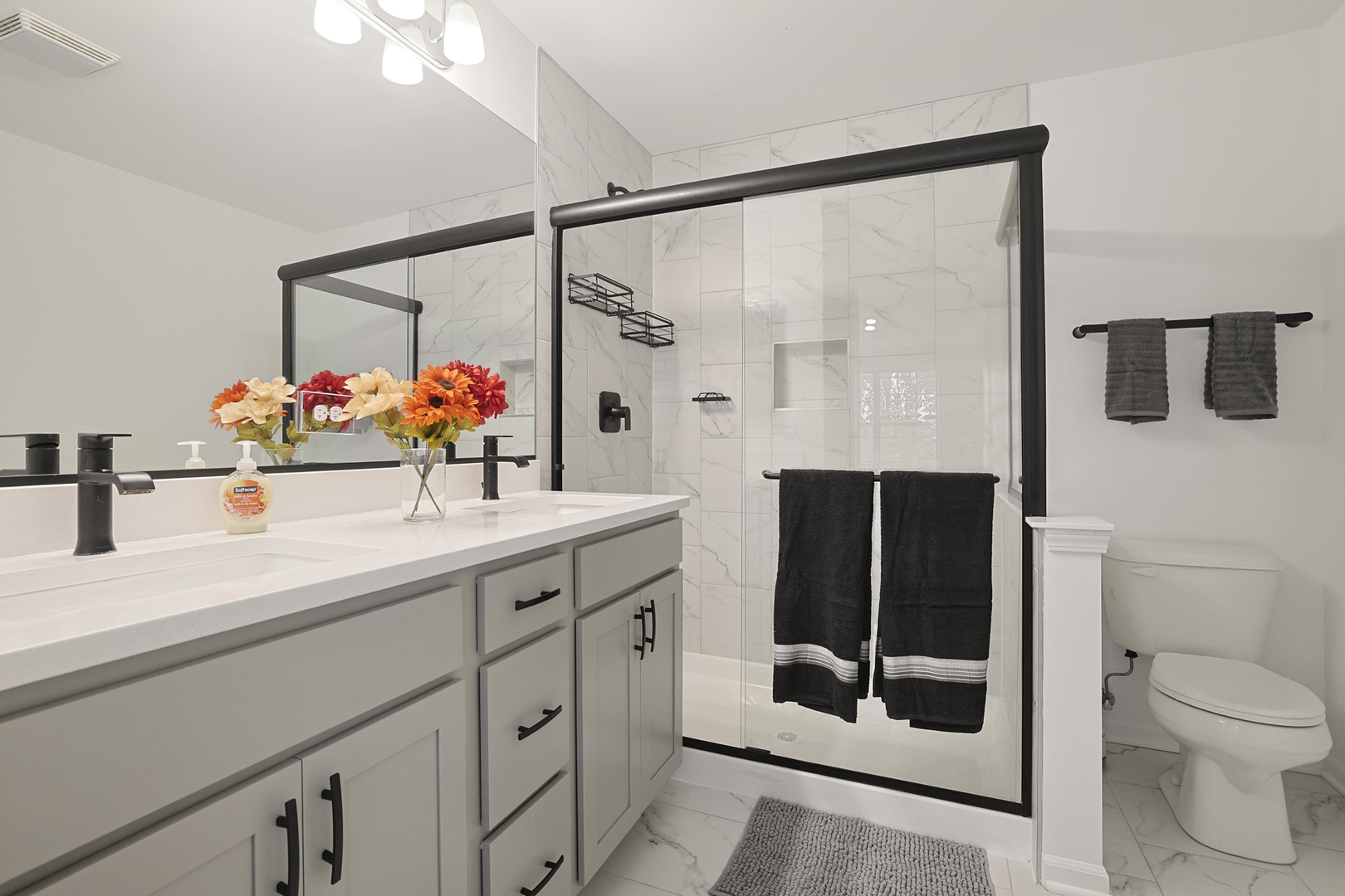 316 Timberleaf Circle Roselle, IL 60172 - Photo 24 of 37 a bathroom with a sink and a mirror