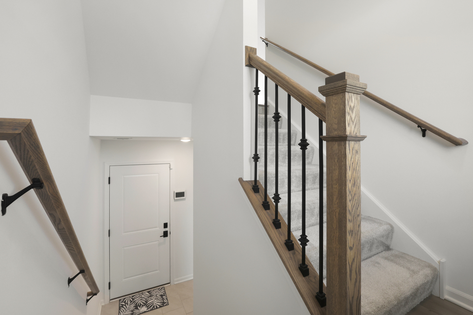316 Timberleaf Circle Roselle, IL 60172 - Photo 32 of 37 a view of staircase with lots of frames on wall and stairs