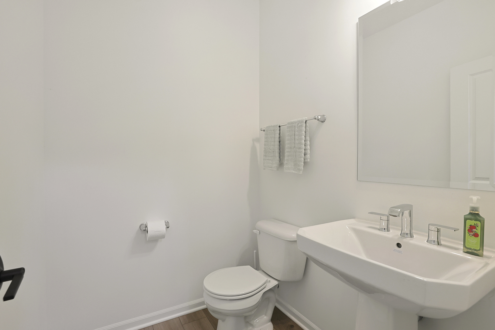 316 Timberleaf Circle Roselle, IL 60172 - Photo 6 of 37 a bathroom with a sink a toilet and mirror