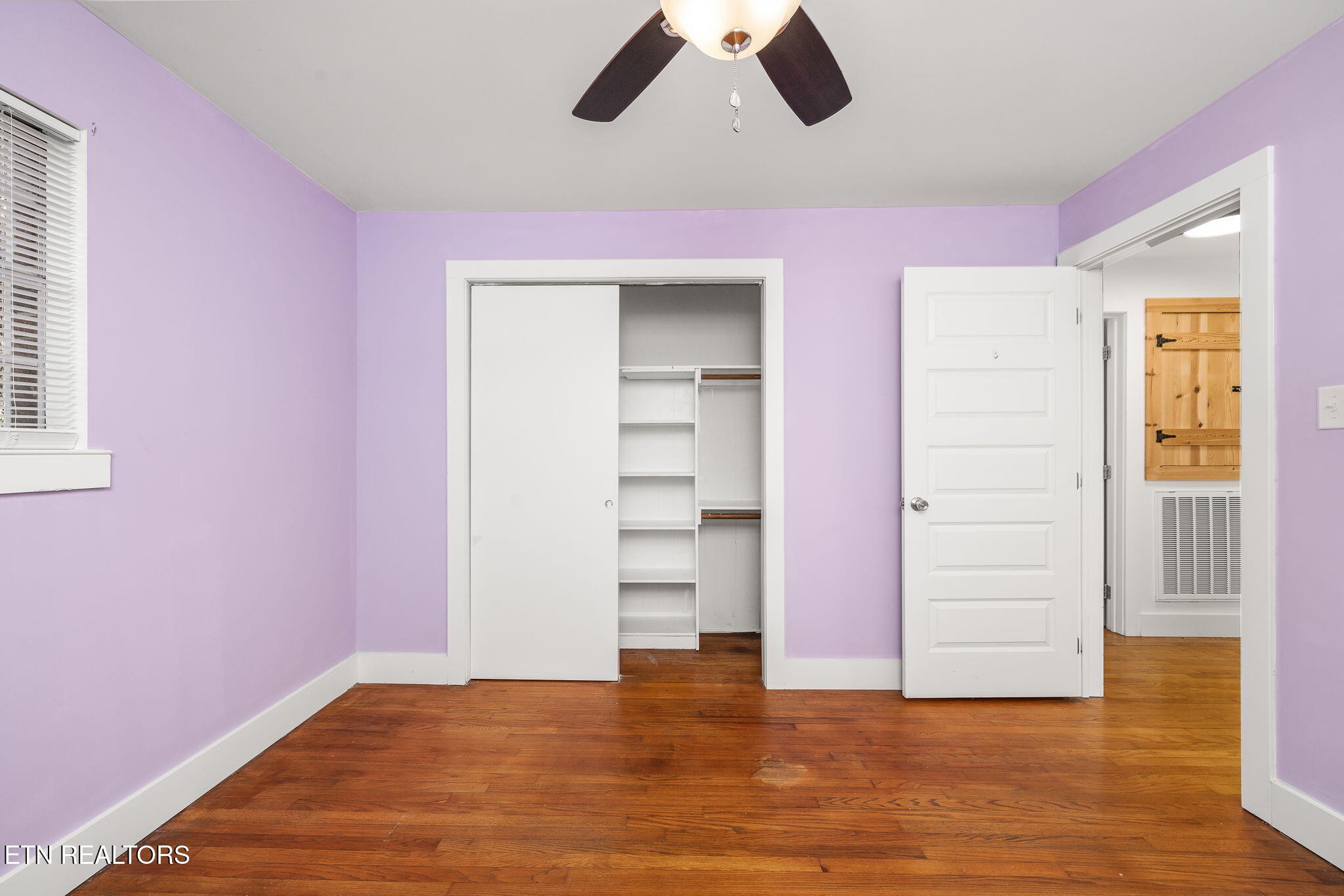 287 Watson Avenue Spring City, TN 37381 - Photo 18 of 24 a view of empty room with wooden floor and fan