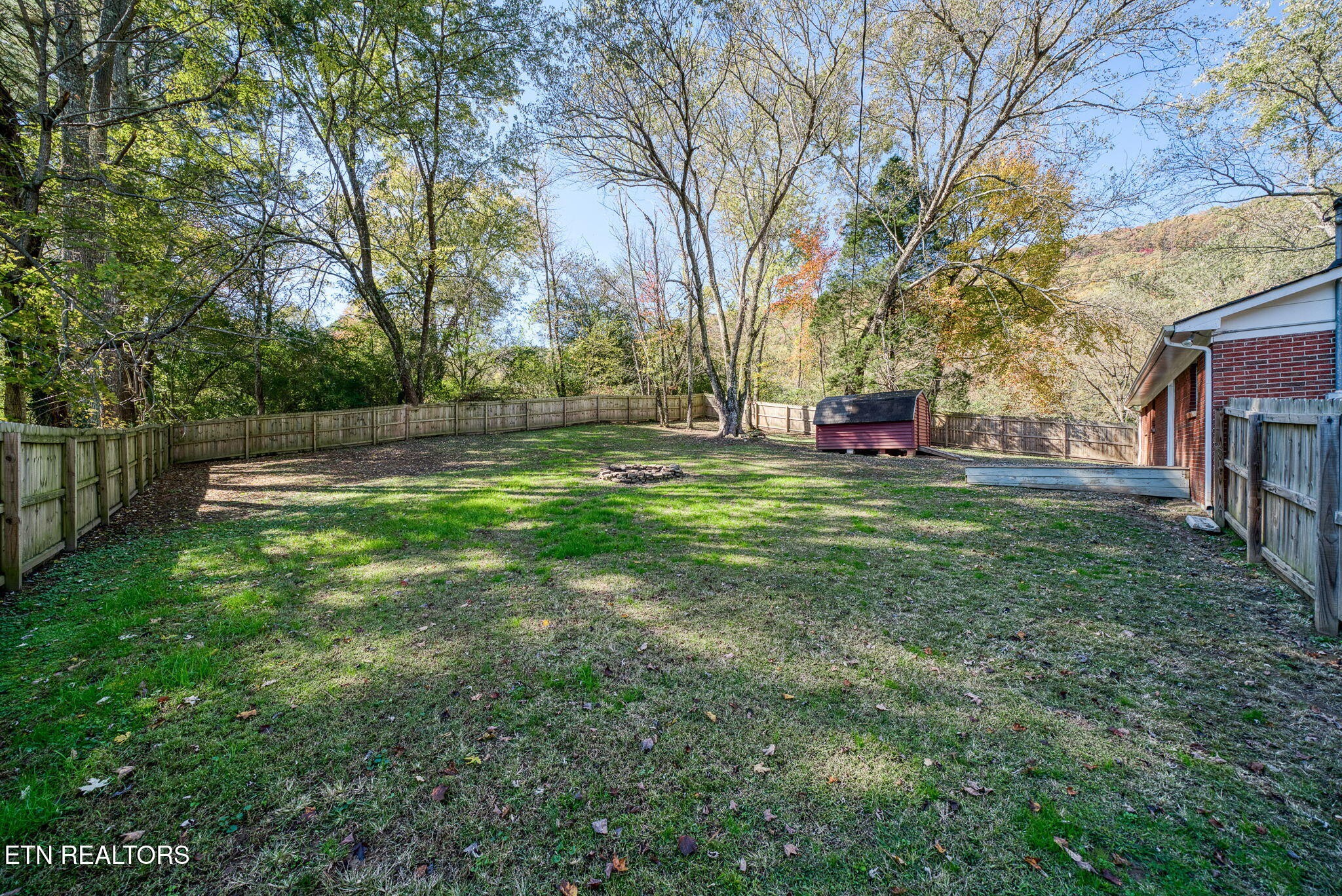 287 Watson Avenue Spring City, TN 37381 - Photo 23 of 24 a view of a park with large trees