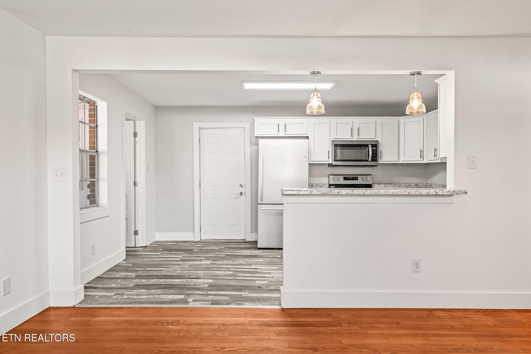 287 Watson Avenue Spring City, TN 37381 - Photo 8 of 24 a view of kitchen view with cabinets and stainless steel appliances