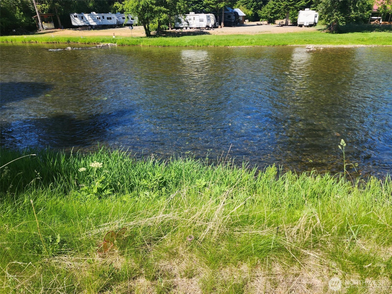 1911 Hundley Road Cle Elum, WA 98922 - Photo 11 of 13 a view of a lake with a big yard