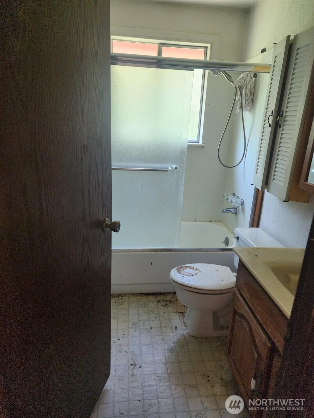 1911 Hundley Road Cle Elum, WA 98922 - Photo 13 of 13 a bathroom with a granite countertop toilet and a shower