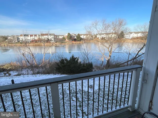 a view of a balcony next to a lake view