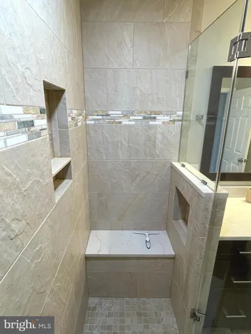 a bathroom with a bathtub