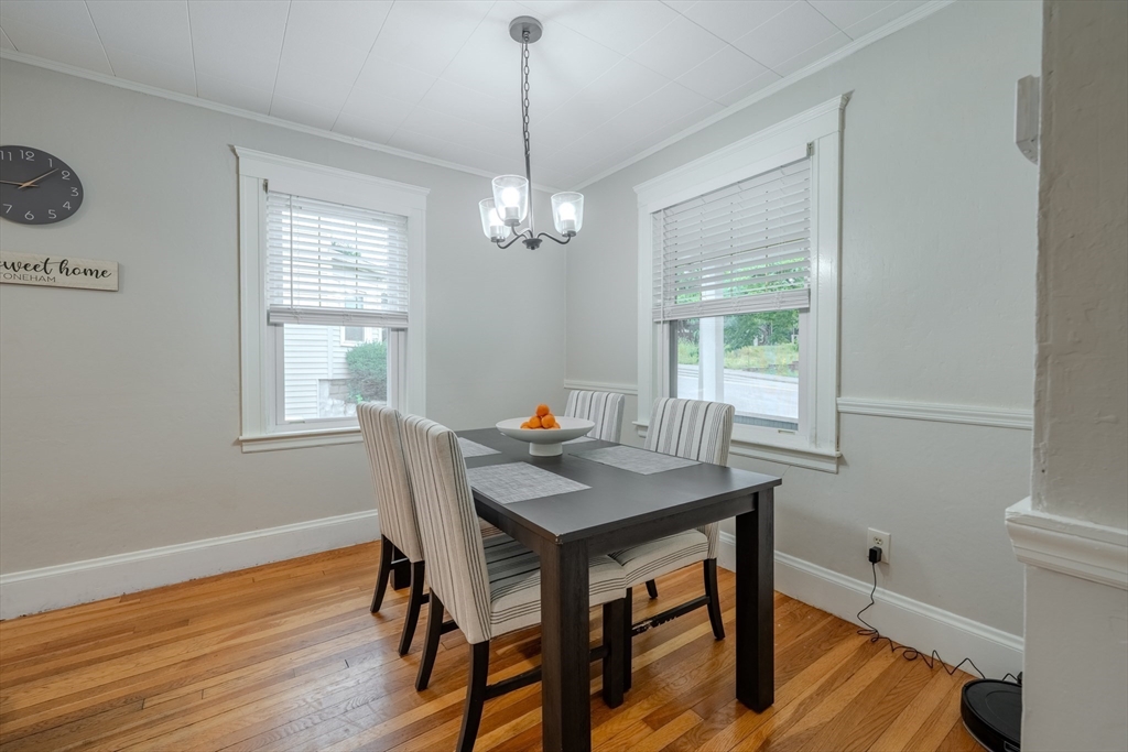 35 Lindenwood Road Stoneham, MA 02180 - Photo 11 of 37 a view of a dining room with furniture window and wooden floor