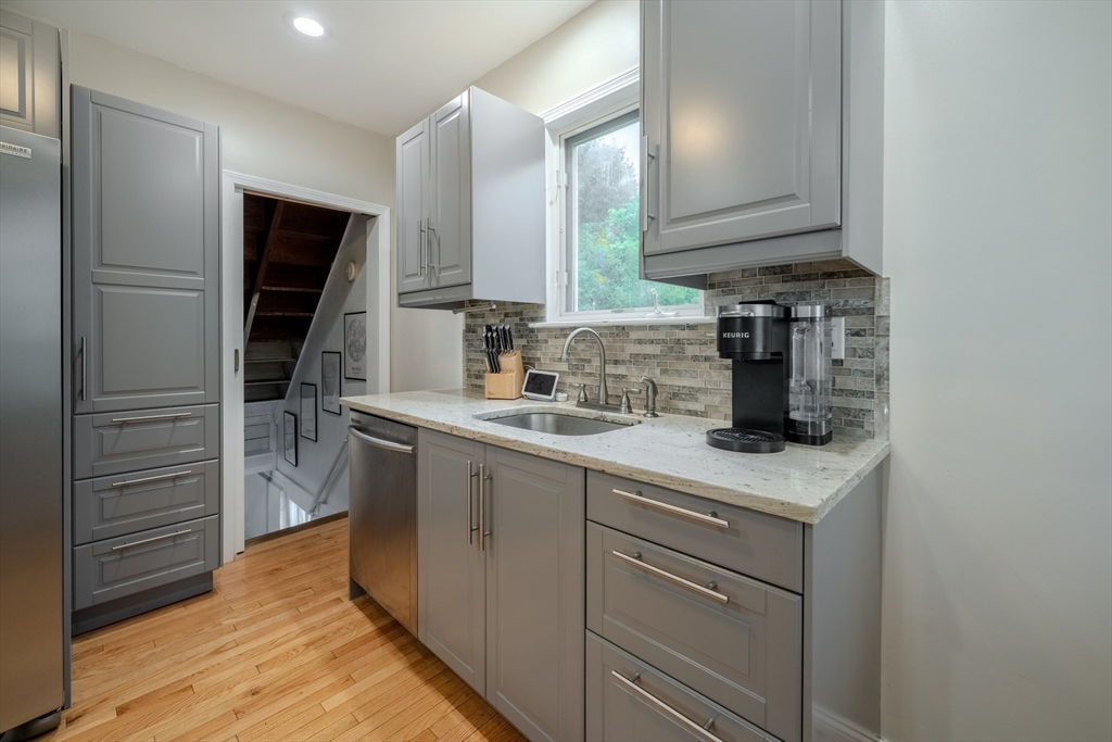 35 Lindenwood Road Stoneham, MA 02180 - Photo 16 of 37 a kitchen with a sink and cabinets