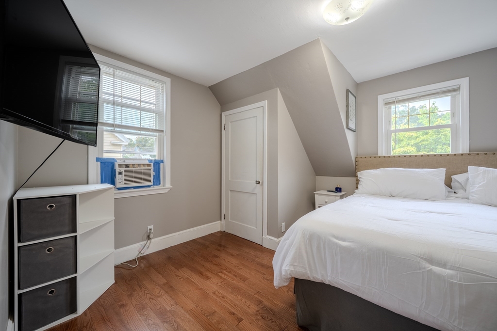 35 Lindenwood Road Stoneham, MA 02180 - Photo 18 of 37 a bedroom with a bed and a window