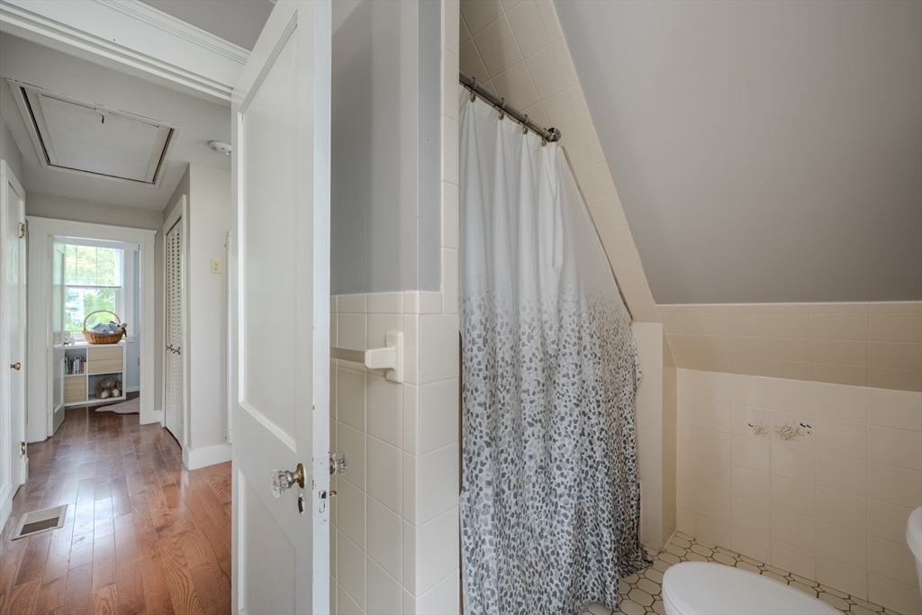 35 Lindenwood Road Stoneham, MA 02180 - Photo 19 of 37 a bathroom with a toilet and a shower