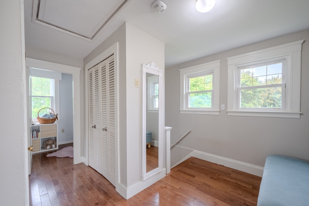 35 Lindenwood Road Stoneham, MA 02180 - Photo 21 of 37 a view of an empty room with wooden floor and a window