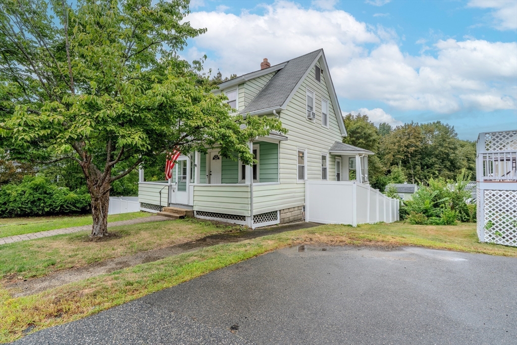 35 Lindenwood Road Stoneham, MA 02180 - Photo 3 of 37 a view of a house with a yard and tree