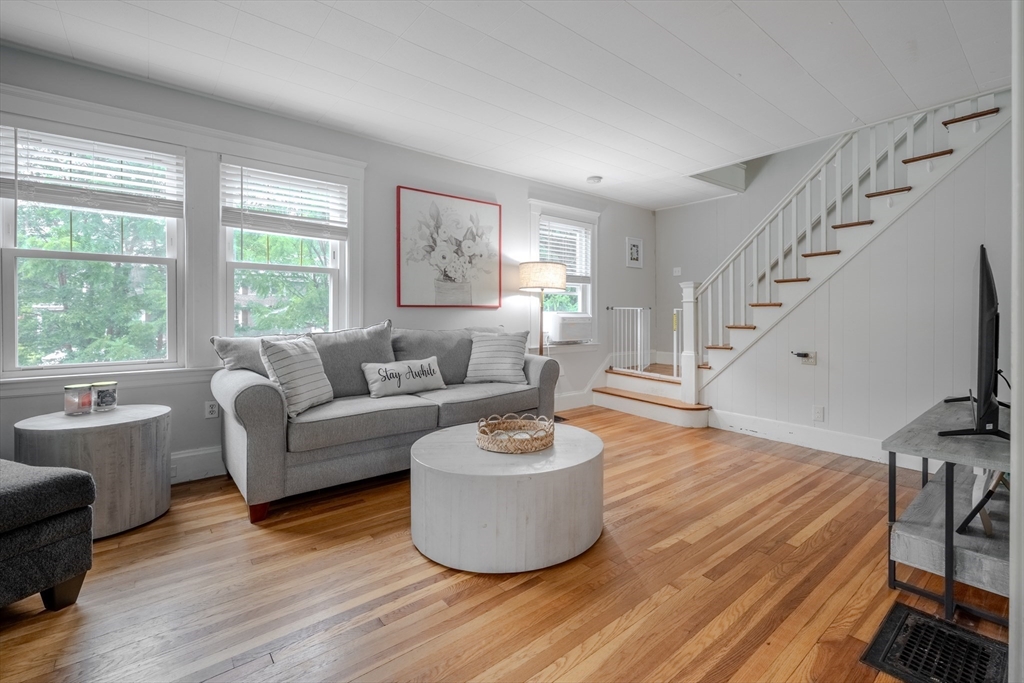 35 Lindenwood Road Stoneham, MA 02180 - Photo 6 of 37 a living room with furniture and a wooden floor